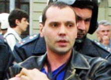 EU's Ashton demands investigation into opposition website founder's death by hanging.
